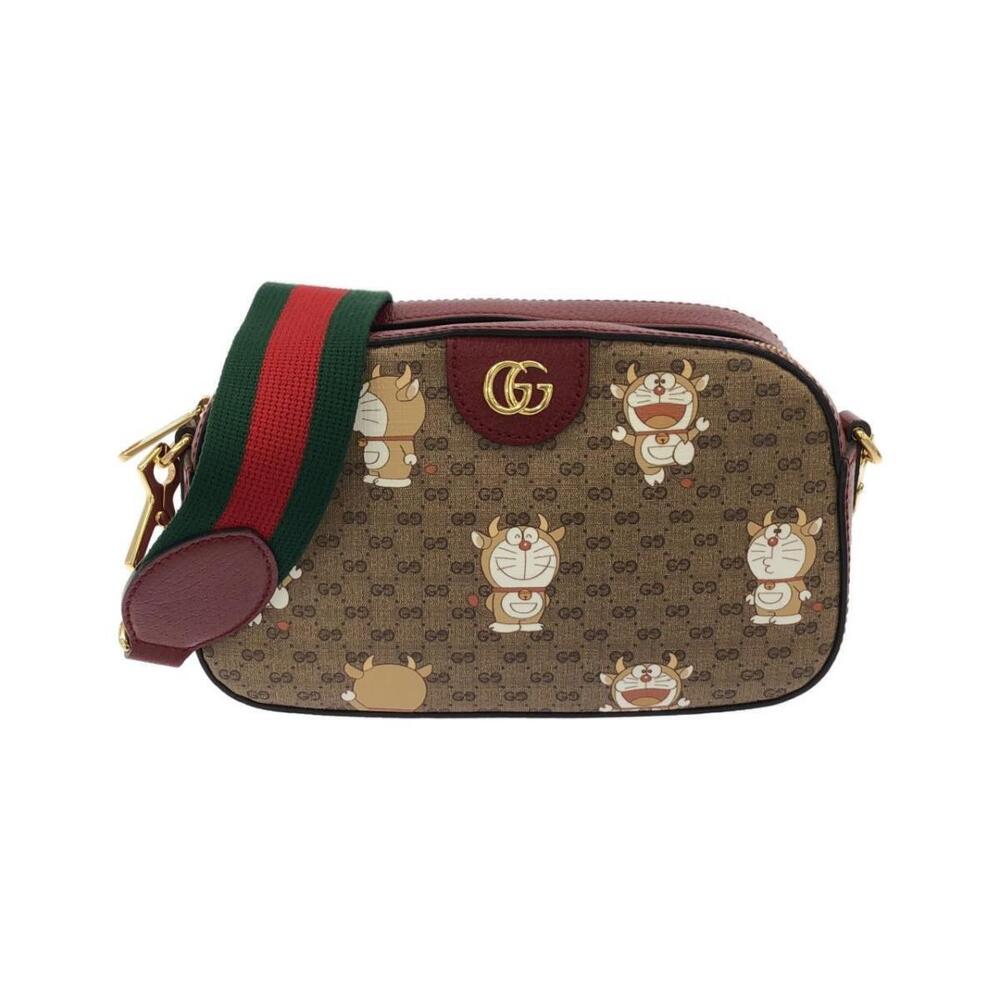 Gucci Doraemon bag iconic GG Supreme canvas Ushidora